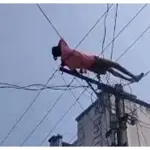 Mentally challenged youth climbs electric pole, rescued