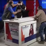 PML-N and PTI leaders kick, punch and abuse each other on Bol News program