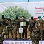 Three more freed hostages handed over to Israeli army