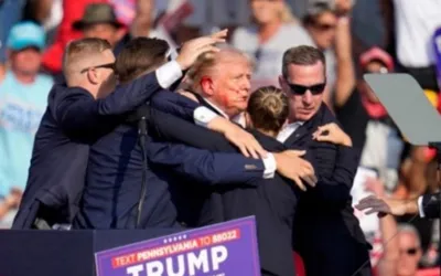 Donald Trump injured in election rally shooting, assailant killed