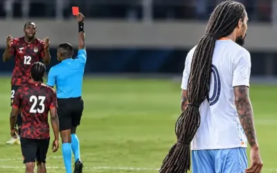 Footballer’s ankle-length hair causes trouble for opponents