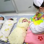 Global birth rates fall as rising costs delay parenthood