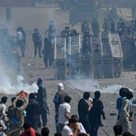 Journalists, cops injured; motorcycle set on fire by protestors in Karachi