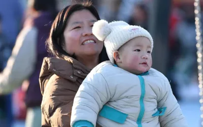 China announces five-year plan to support families, boost births