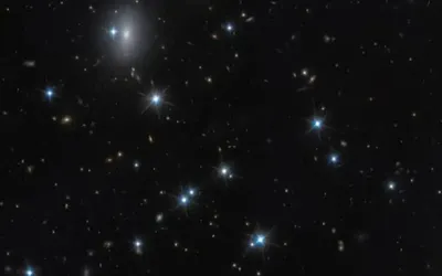 Astronomers spot nearly invisible galaxy packed with dark matter