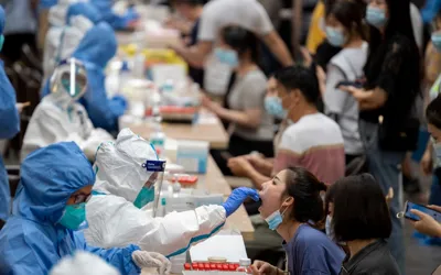 Virus surge in China: 7,000 cases reported, fears of Lockdown