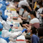 Virus surge in China: 7,000 cases reported, fears of Lockdown