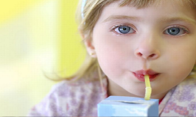 Kid drinking juice
