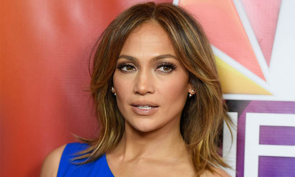 Jennifer Lopez shines in the air wearing a pretty white frock