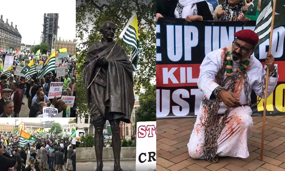 Protesters waves Kashmir’s flag on Gandhi’s statue