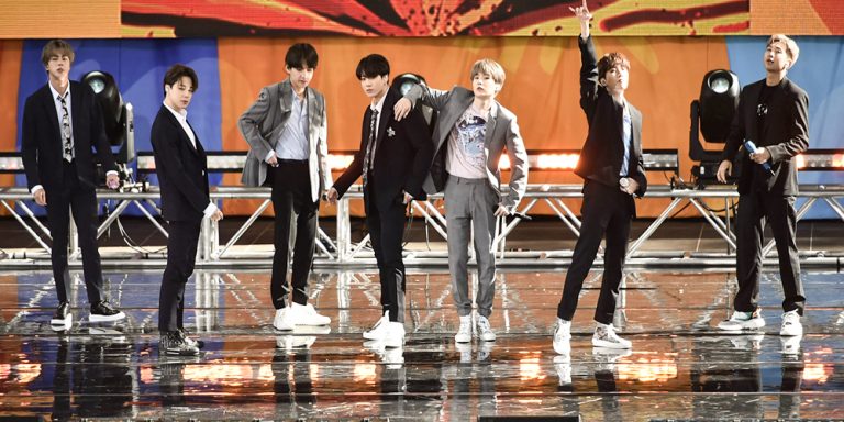 Seven microphones used by Korean Pop band BTS have been sold at a pre-Grammy Awards auction.