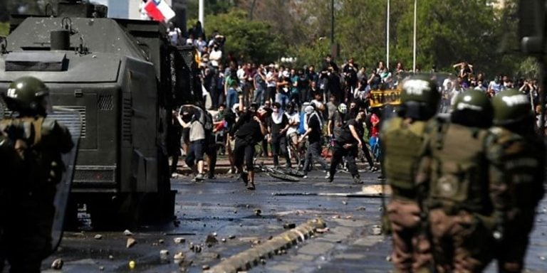 Dozens injured after fare hike stirs violent unrest in Chile