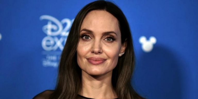 Angelina Jolie tells people to “love each other” and “check in with each other”