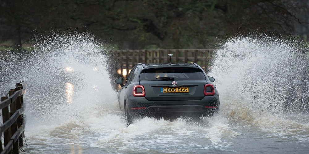 Heavy rain to continue in UK after floods sparked disruption on roads