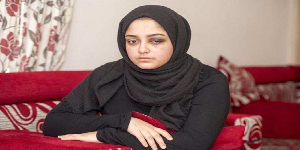 Muslim girl wearing hijab beaten by a woman in London