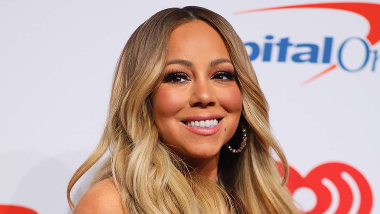 Mariah Carey tops the Billboard charts in four decades