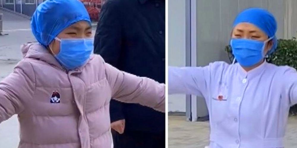 Coronavirus: Video of Chinese Nurse gives air hug to daughter will leave you teary-eyed