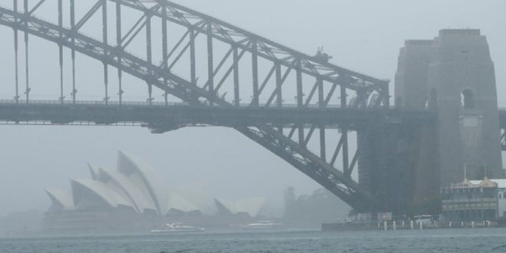 Torrential rain has extinguished a third of fires in New South Wales.