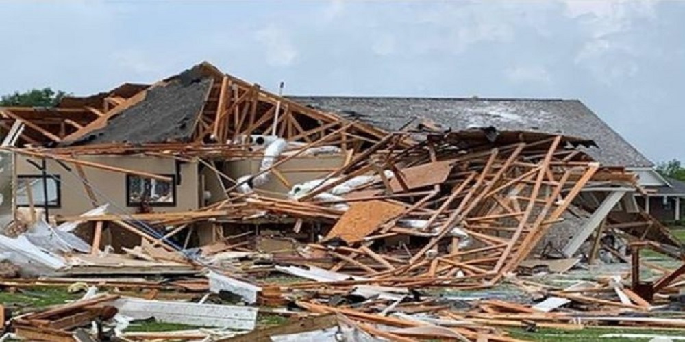 At least 6 people have died as storms triggered flooding and tornadoes in several US states.