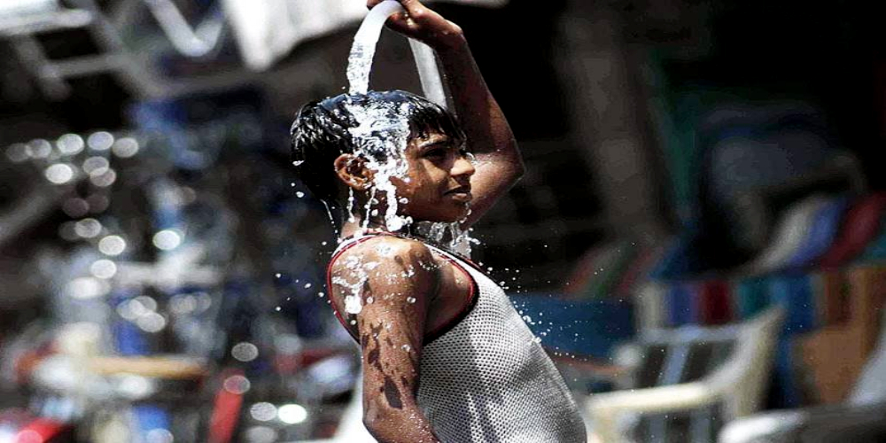 Heat waves collide with coronavirus pandemic in Sindh