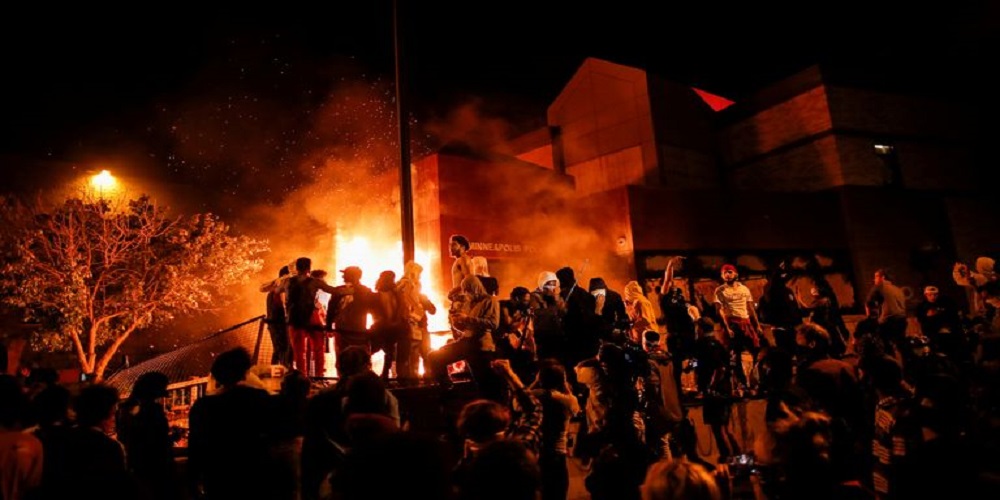 Protesters set Minneapolis police station on fire over George Floyd's death