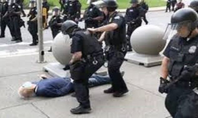 Two US policemen charged for assaulting 75-year-old protester