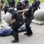 Two US policemen charged for assaulting 75-year-old protester