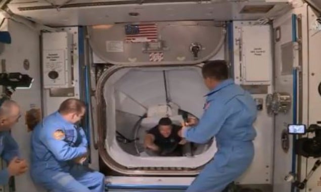 Astronauts enter space station via private air craft for the first time