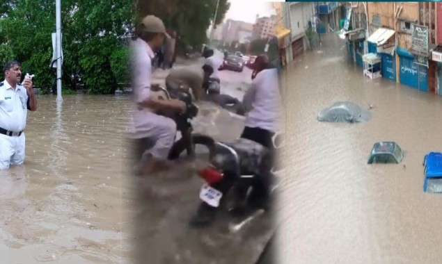 Roads and streets turn into ponds after heavy rains lash Karachi