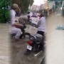 Roads and streets turn into ponds after heavy rains lash Karachi