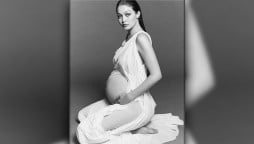 Gigi Hadid flaunts her baby bump in latest photos