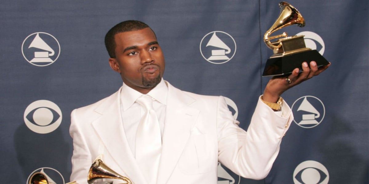 Kanye West peeing over Grammy Award