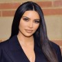 Kim Kardashian flaunts her toned body in a black swimsuit, see photos