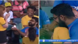 Boy proposes girl during match