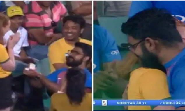 Boy proposes girl during match