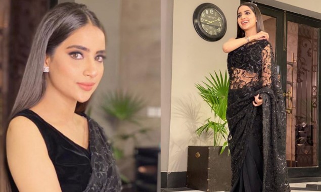 Check out how Saboor Aly rocks a black-colored saree
