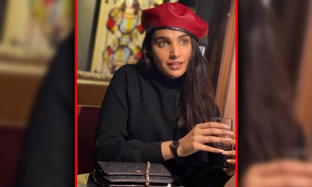 Amna Ilyas Poses With Red Ankle Boots To Stay Winter Chic