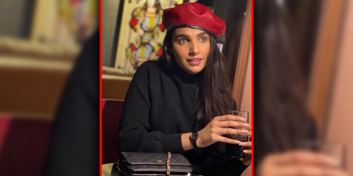 Amna Ilyas Poses With Red Ankle Boots To Stay Winter Chic