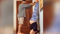 Virat Kohli helps Anushka Sharma to do yoga, picture goes viral