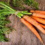 What other benefits may carrots have apart from increasing vision?