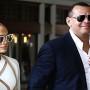 Jennifer Lopez rocks a strapless button down and high-waisted pants