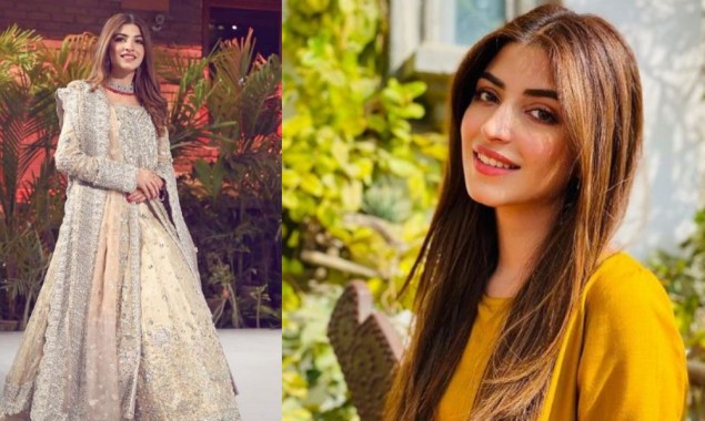 Kinza Hashmi looks radiant donning an exquisitely scenic ivory dress