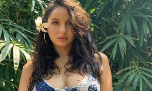 Nora Fatehi shares sizzling photos vacationing by the beach