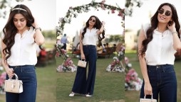 Maya Ali is giving major chic vibes donning bell-bottom jeans, sleeveless shirt