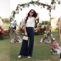Maya Ali is giving major chic vibes donning bell-bottom jeans, sleeveless shirt