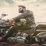 Sana Javed drives her husband around town on a heavy bike