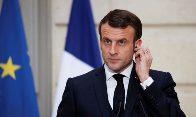French President Emmanuel Macron slapped during the walkabout