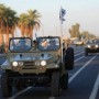 Iraq militias show off weaponry in big, anniversary parade