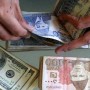Rupee weakens against dollar