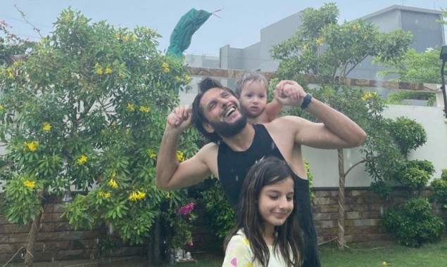 Shahid Afridi Enjoying the First Spell of Monsoon with his kids